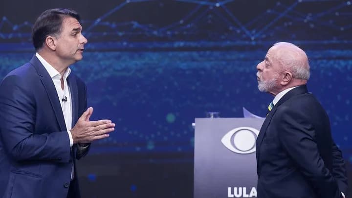 Flávio Bolsonaro e Lula frente a frente no debate da Band